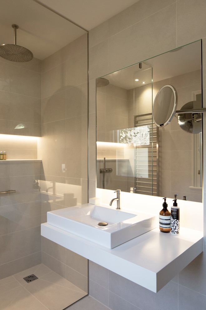 Medium sized contemporary shower room bathroom in Other with flat-panel cabinets, a freestanding bath, a walk-in shower, a wall mounted toilet, beige tiles, porcelain tiles, beige walls, porcelain flooring, a wall-mounted sink and wooden worktops.