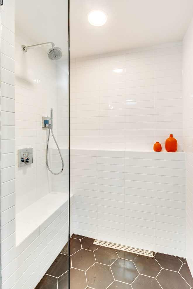 Example of a mid-sized trendy 3/4 white tile and ceramic tile porcelain tile and gray floor bathroom design in Chicago with furniture-like cabinets, white cabinets, a one-piece toilet, gray walls, an integrated sink and white countertops