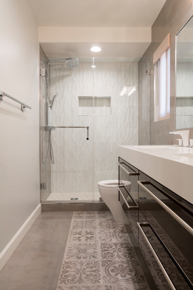 Example of a mid-sized trendy 3/4 white tile and porcelain tile porcelain tile and brown floor doorless shower design in Los Angeles with flat-panel cabinets, brown cabinets, a bidet, white walls, a drop-in sink, quartzite countertops and a hinged shower door