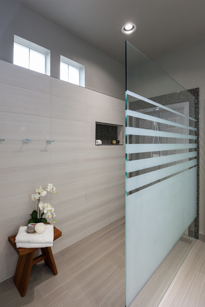 Mid-sized trendy master black tile, gray tile and mosaic tile porcelain tile doorless shower photo in Dallas with flat-panel cabinets, white cabinets, gray walls, an undermount sink and solid surface countertops