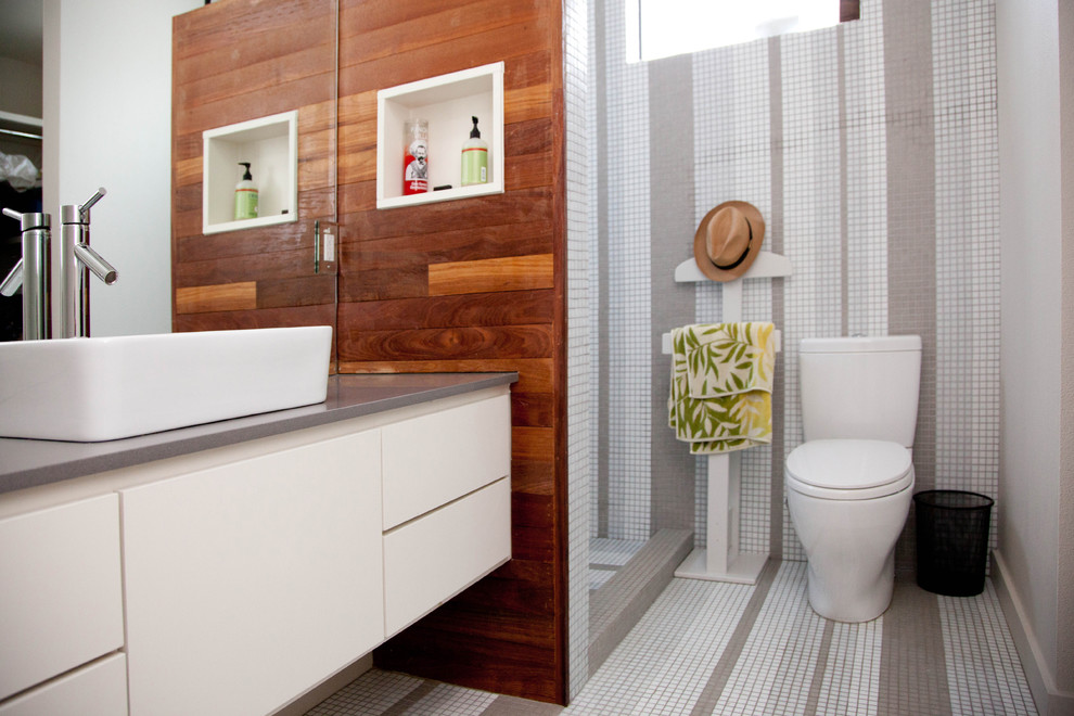 Idée de décoration pour une salle de bain design avec une vasque.