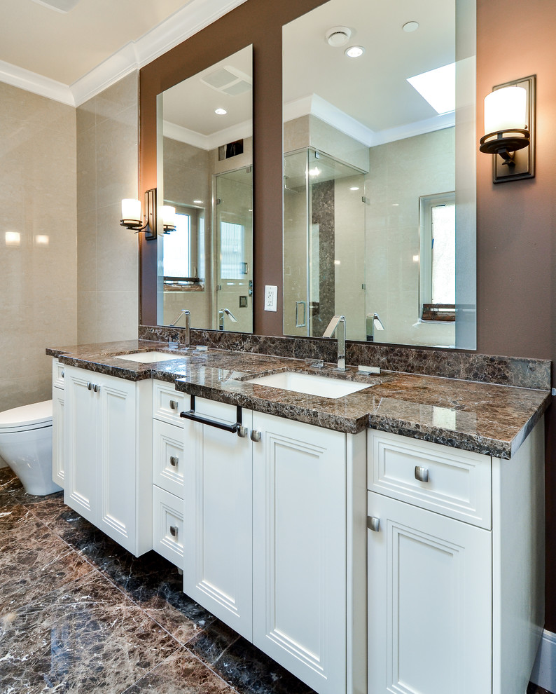 Photo of a large contemporary bathroom in Vancouver with recessed-panel cabinets, white cabinets, a submerged sink and granite worktops.