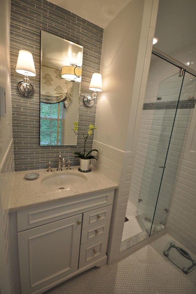 Design ideas for a medium sized classic shower room bathroom in DC Metro with recessed-panel cabinets, white cabinets, an alcove shower, a two-piece toilet, grey tiles, white tiles, metro tiles, white walls, ceramic flooring, a submerged sink and engineered stone worktops.