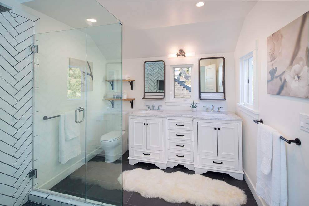 Design ideas for a small contemporary ensuite bathroom in San Francisco with white tiles, porcelain tiles, white walls, slate flooring and a pedestal sink.