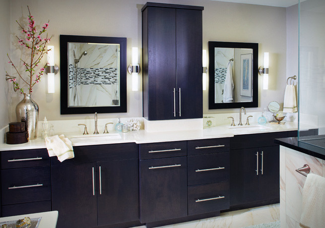Design ideas for a large contemporary ensuite bathroom in Seattle with flat-panel cabinets, dark wood cabinets, a corner shower, a two-piece toilet, beige walls, ceramic flooring, a submerged sink, quartz worktops, beige floors and a hinged door.