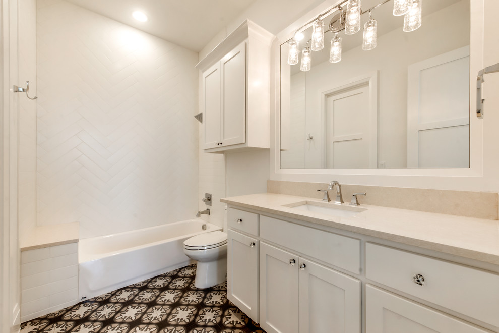 Design ideas for a large contemporary ensuite bathroom in Dallas with shaker cabinets, white cabinets, a freestanding bath, a double shower, a two-piece toilet, white tiles, metro tiles, white walls, porcelain flooring, a submerged sink and engineered stone worktops.