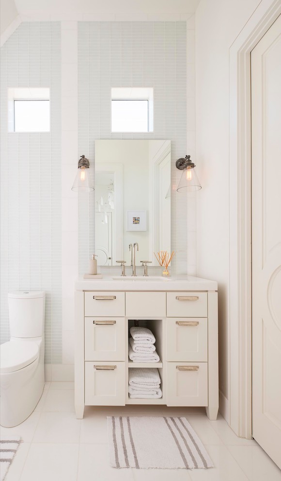 Bathroom - mid-sized transitional kids' multicolored tile and glass tile ceramic tile bathroom idea in Dallas with shaker cabinets, white cabinets, white walls and an undermount sink