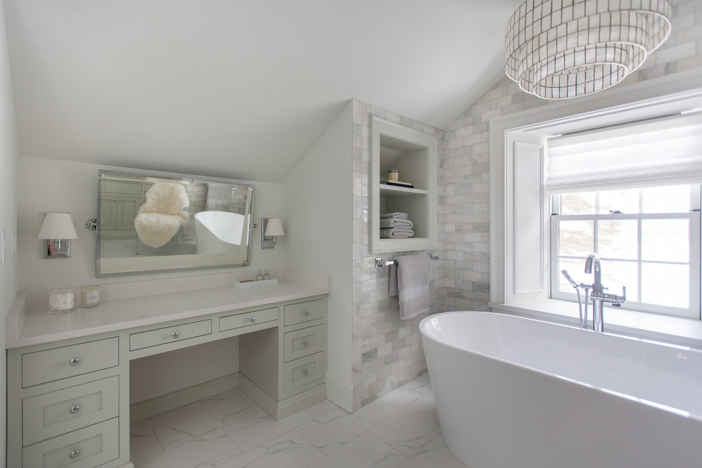 Example of a mid-sized trendy master marble tile and white tile marble floor and white floor bathroom design in Toronto with shaker cabinets, gray cabinets, white walls, a one-piece toilet, an undermount sink, quartz countertops and a hinged shower door