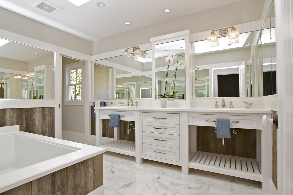 Example of a cottage bathroom design in San Francisco with white cabinets