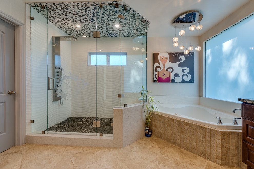 Example of a large beach style master multicolored tile and ceramic tile ceramic tile and beige floor bathroom design in San Francisco with raised-panel cabinets, dark wood cabinets, a one-piece toilet, white walls, an integrated sink and a hinged shower door