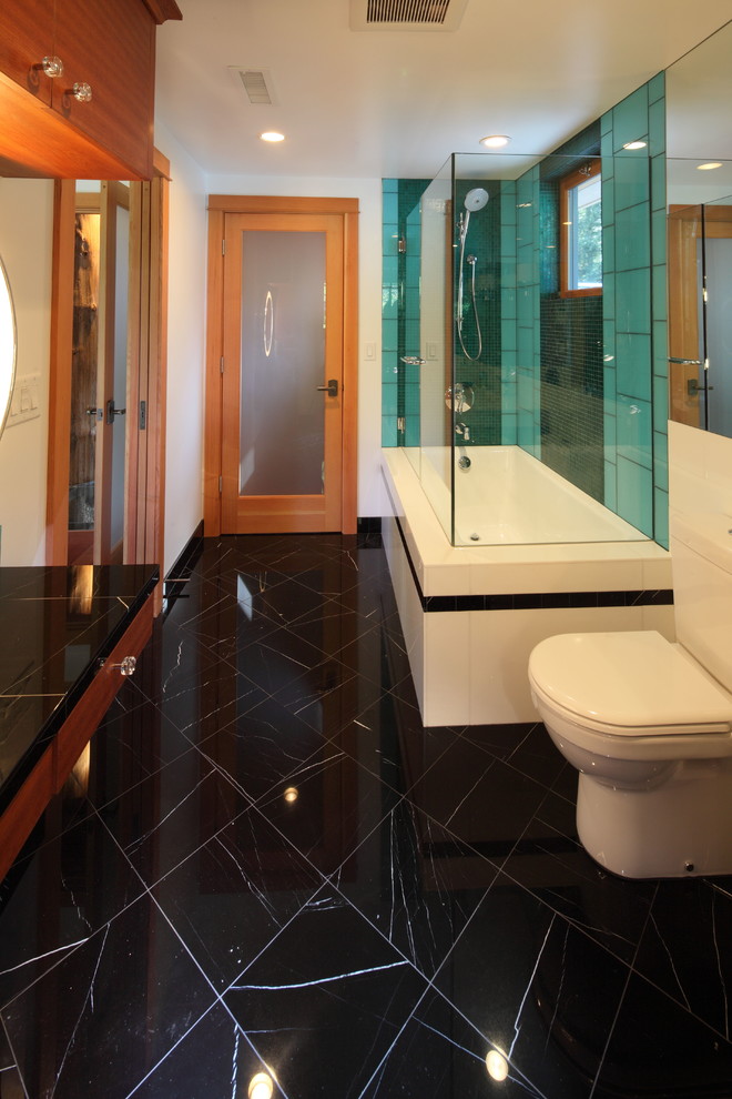 This is an example of a large contemporary ensuite bathroom in Portland with tiled worktops, green tiles, glass tiles, white walls and marble flooring.