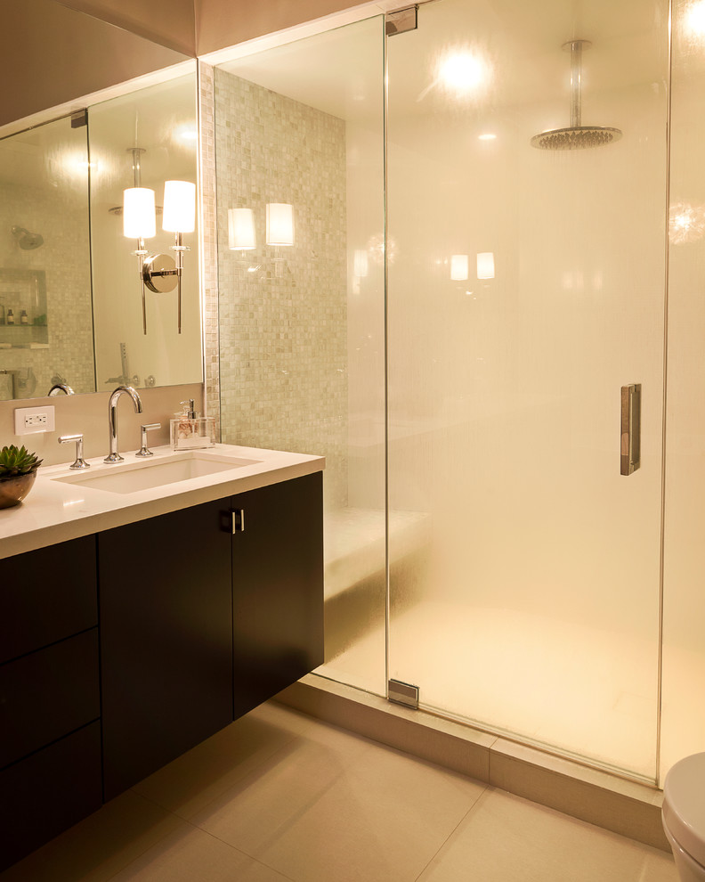 Example of a mid-sized minimalist master white tile and mosaic tile porcelain tile bathroom design in Los Angeles with an undermount sink, flat-panel cabinets, dark wood cabinets, quartz countertops, a wall-mount toilet and beige walls