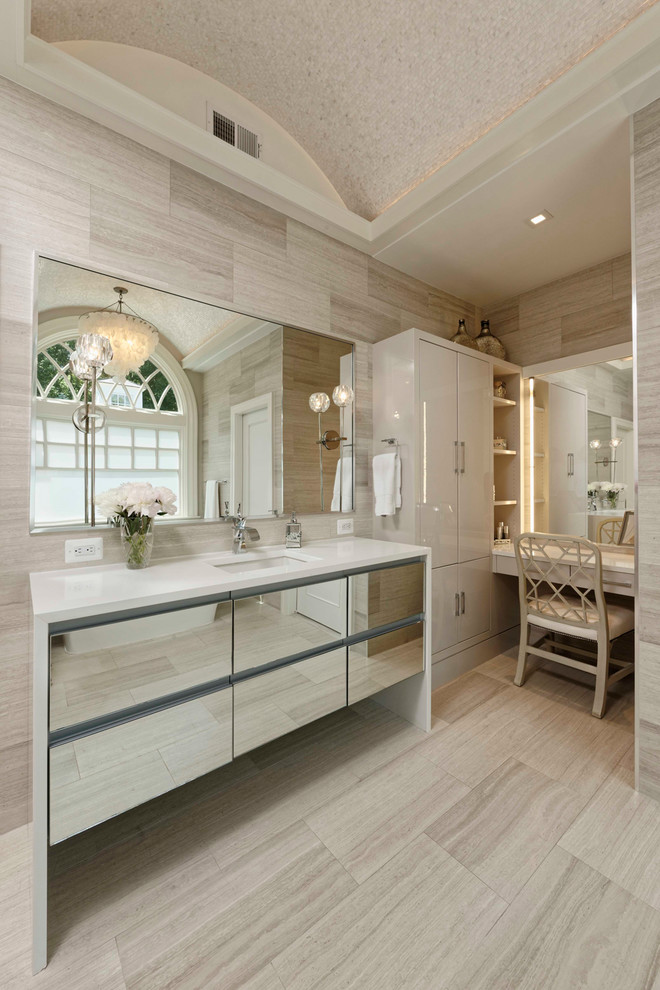 На фото: главная ванная комната в современном стиле с плоскими фасадами, бежевой плиткой, бежевыми стенами, врезной раковиной, бежевым полом и белой столешницей