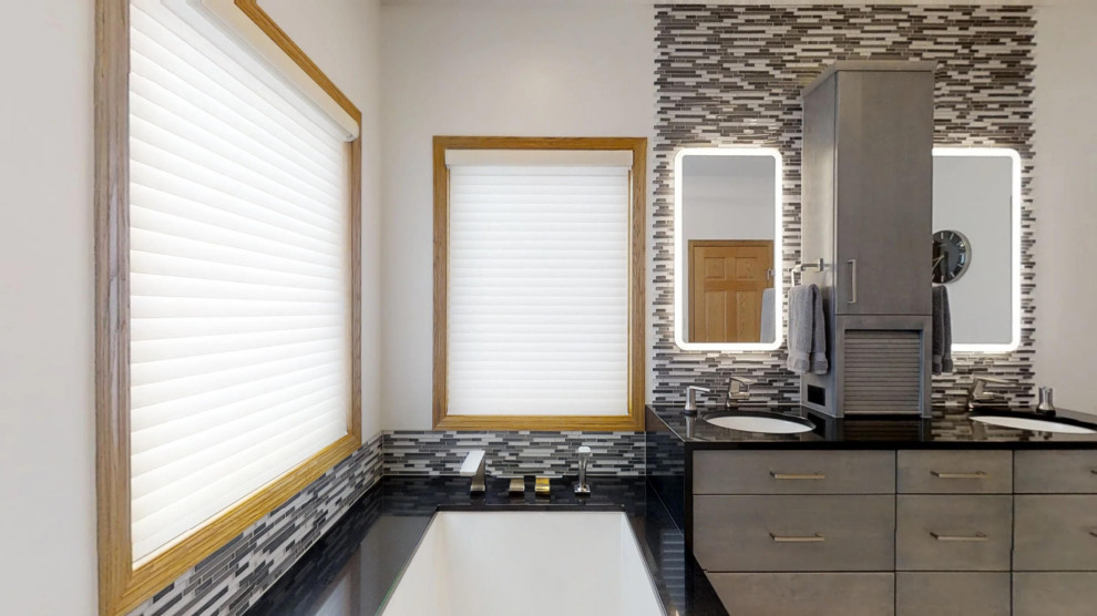 Modernes Badezimmer En Suite mit schwarz-weißen Fliesen in Sonstige