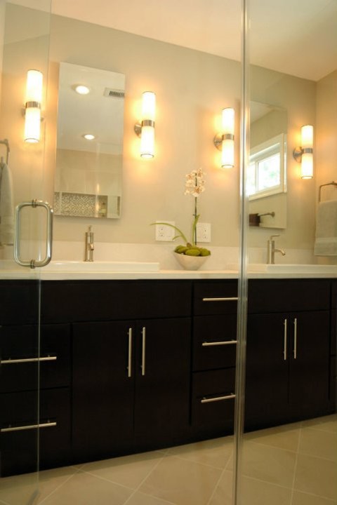 Design ideas for a medium sized contemporary ensuite bathroom in DC Metro with a built-in sink, flat-panel cabinets, dark wood cabinets and beige walls.