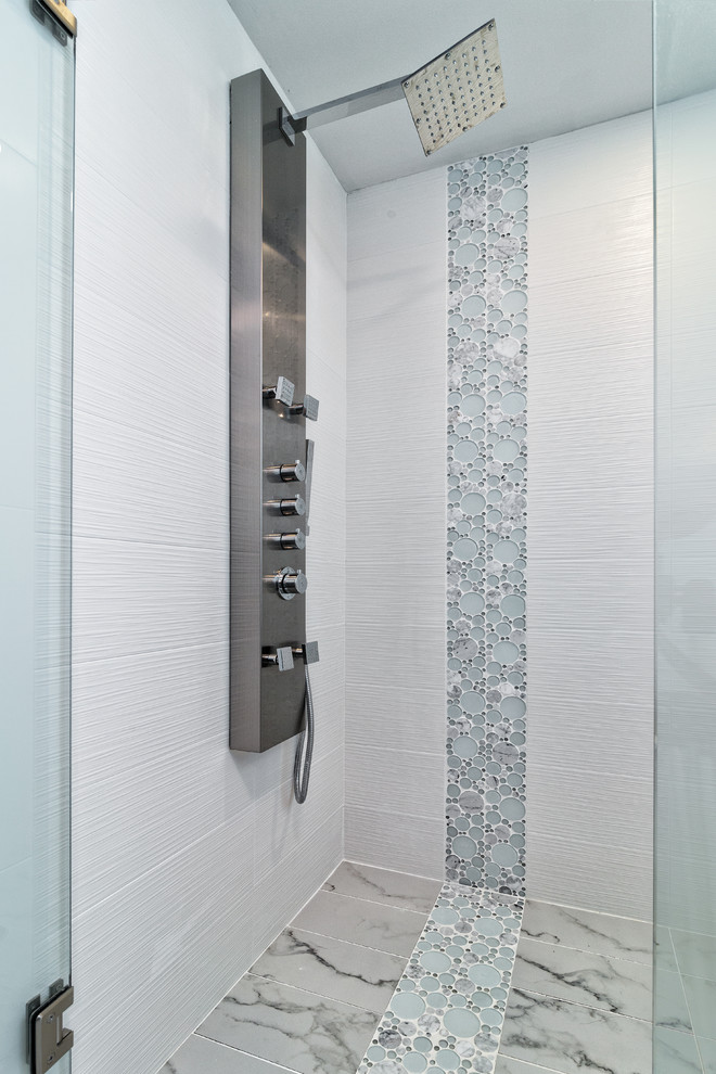 Doorless shower - mid-sized contemporary master gray tile and porcelain tile porcelain tile doorless shower idea in Miami with an integrated sink, flat-panel cabinets, dark wood cabinets, a one-piece toilet and gray walls