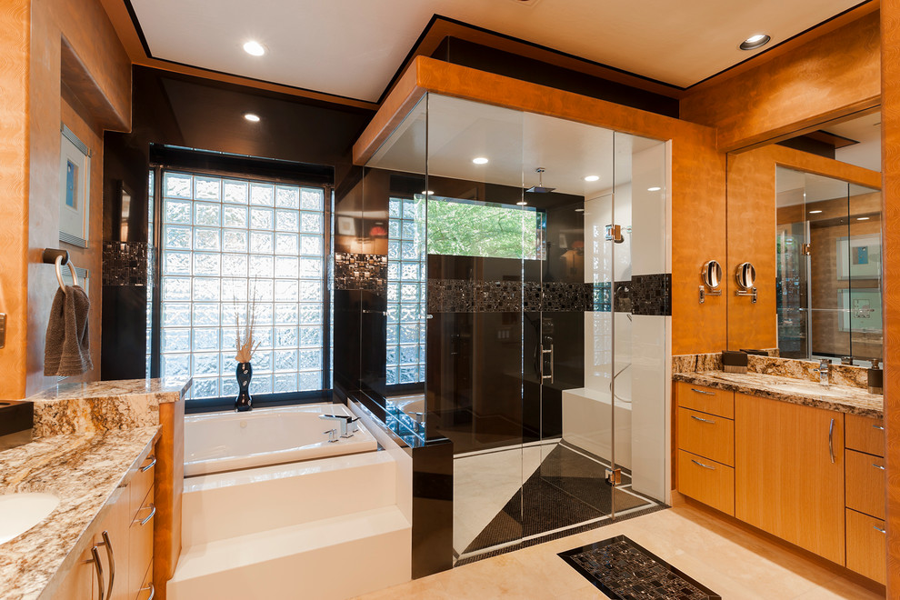 Bathroom - mid-sized contemporary master black tile and mosaic tile travertine floor bathroom idea in Phoenix with an undermount sink, flat-panel cabinets, light wood cabinets, granite countertops, a one-piece toilet and multicolored walls