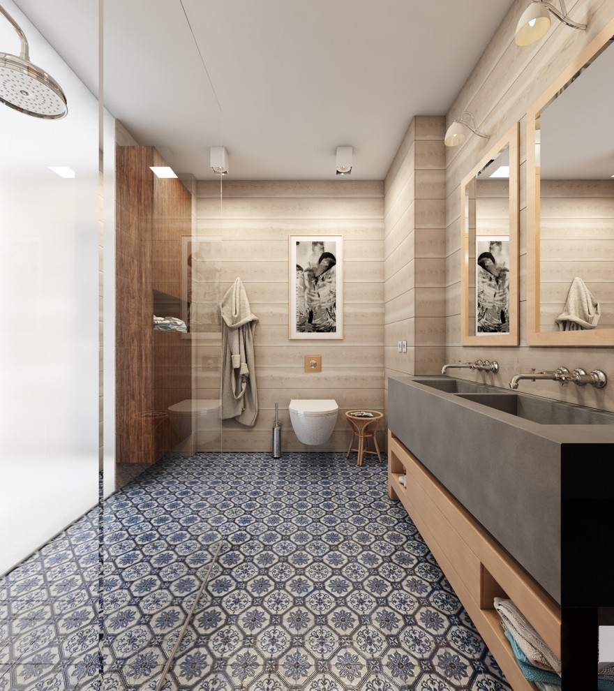 Design ideas for a large mediterranean ensuite bathroom in London with open cabinets, light wood cabinets, a shower/bath combination, a wall mounted toilet, beige tiles, ceramic tiles, beige walls, terracotta flooring, a console sink and concrete worktops.