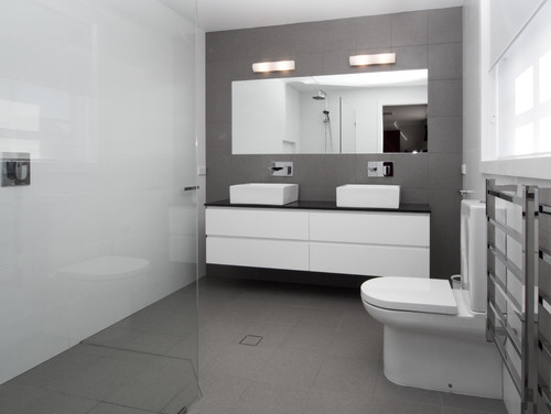 Idee per una stanza da bagno contemporanea con piastrelle grigie, piastrelle in gres porcellanato e pavimento in gres porcellanato