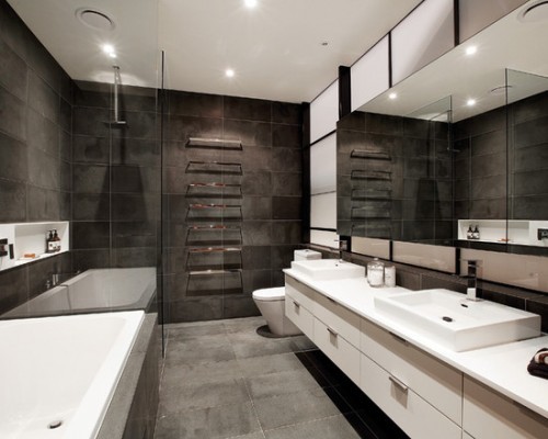 Пример оригинального дизайна: ванная комната в современном стиле с серой плиткой, керамогранитной плиткой и полом из керамогранита