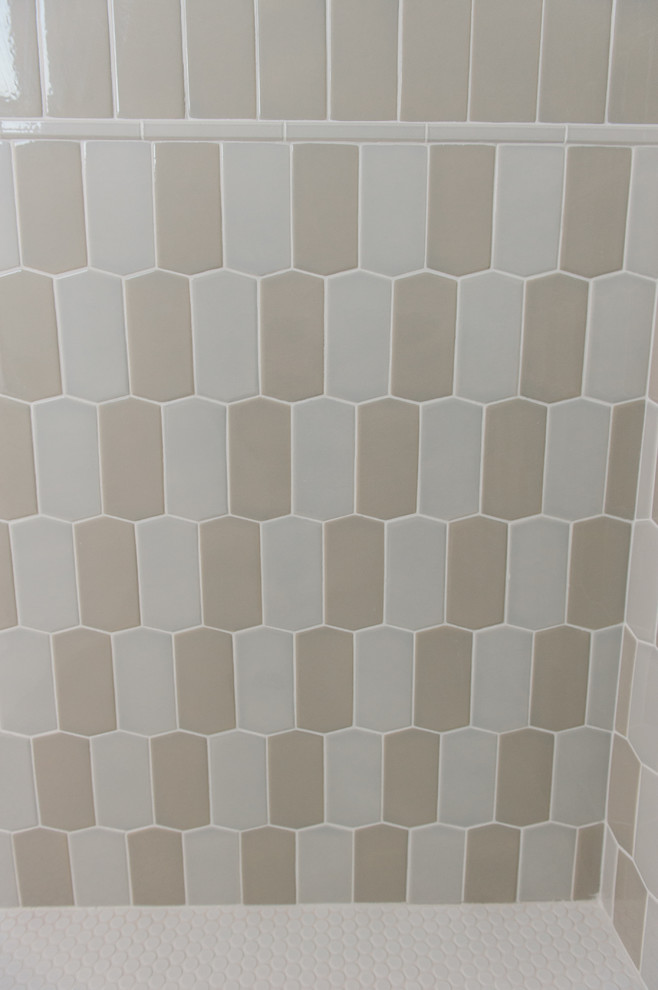 Trendy gray tile and ceramic tile bathroom photo in Orange County