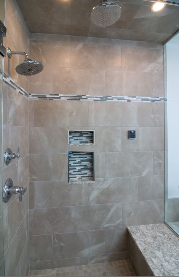 This is an example of a medium sized contemporary ensuite bathroom in Boston with recessed-panel cabinets, white cabinets, a built-in bath, an alcove shower, a two-piece toilet, grey tiles, porcelain tiles, white walls, porcelain flooring, a submerged sink, engineered stone worktops, grey floors, a hinged door and multi-coloured worktops.