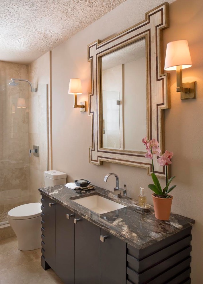 Inspiration for a mid-sized contemporary 3/4 porcelain tile alcove shower remodel in Orlando with flat-panel cabinets, dark wood cabinets, a two-piece toilet, beige walls, an undermount sink and granite countertops