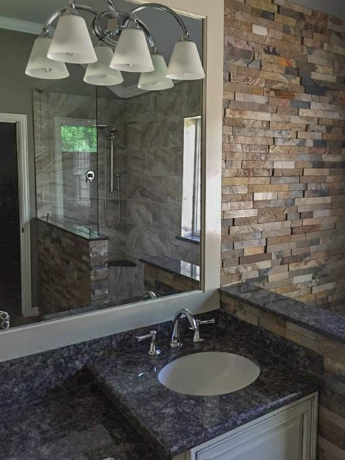 Bathroom - mid-sized shabby-chic style master multicolored tile and mosaic tile bathroom idea in Houston with flat-panel cabinets, white cabinets, a one-piece toilet, multicolored walls, an undermount sink and granite countertops