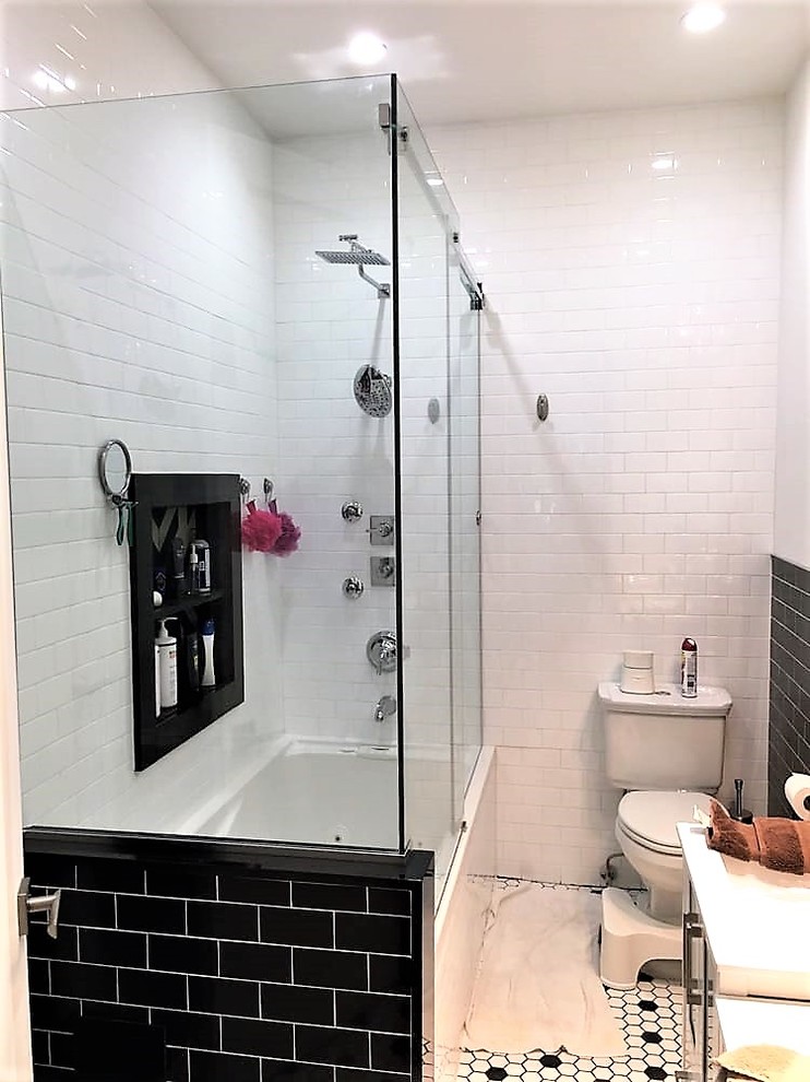 Example of a mid-sized transitional 3/4 white tile and subway tile mosaic tile floor and multicolored floor bathroom design in New York with a two-piece toilet and white walls
