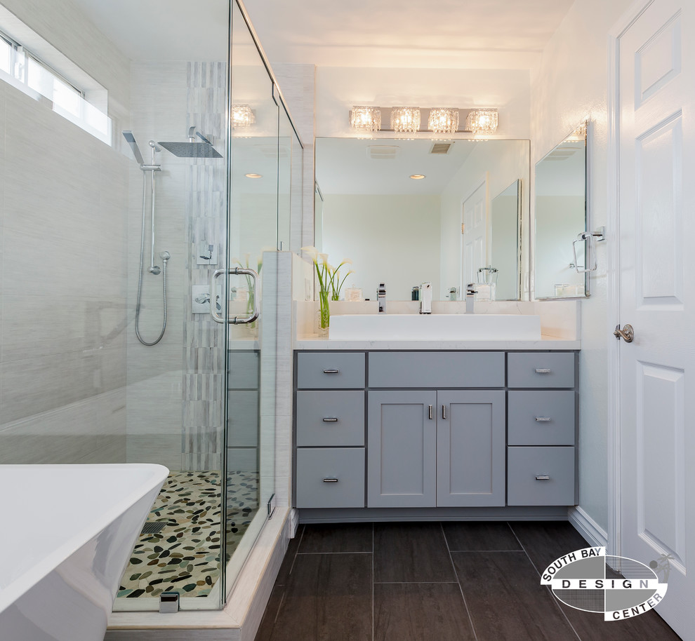 Contemporary ensuite bathroom in Los Angeles with shaker cabinets, grey cabinets, a freestanding bath, a corner shower, white walls and engineered stone worktops.