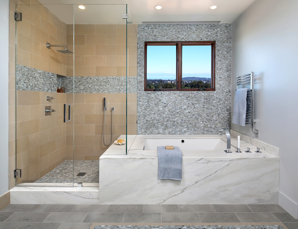 Large contemporary ensuite bathroom in San Francisco with a submerged bath, a corner shower, beige tiles, multi-coloured tiles, grey walls, a hinged door, mosaic tiles, porcelain flooring and grey floors.