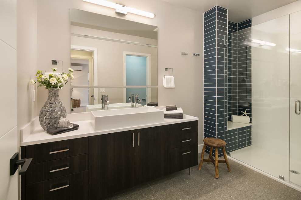 Large contemporary family bathroom in Seattle with flat-panel cabinets, brown cabinets, a walk-in shower, blue tiles, a built-in sink and white worktops.