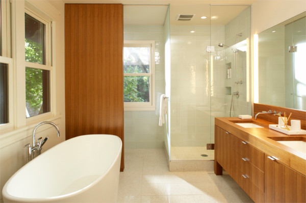 Inspiration for a large contemporary master white tile and glass tile terrazzo floor bathroom remodel in Minneapolis with an undermount sink, flat-panel cabinets, medium tone wood cabinets, wood countertops, a one-piece toilet and white walls