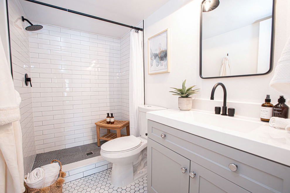 Shower curtain - small farmhouse master white tile and porcelain tile porcelain tile, white floor and single-sink shower curtain idea in Orlando with gray cabinets, a one-piece toilet, gray walls, quartzite countertops, white countertops and a freestanding vanity