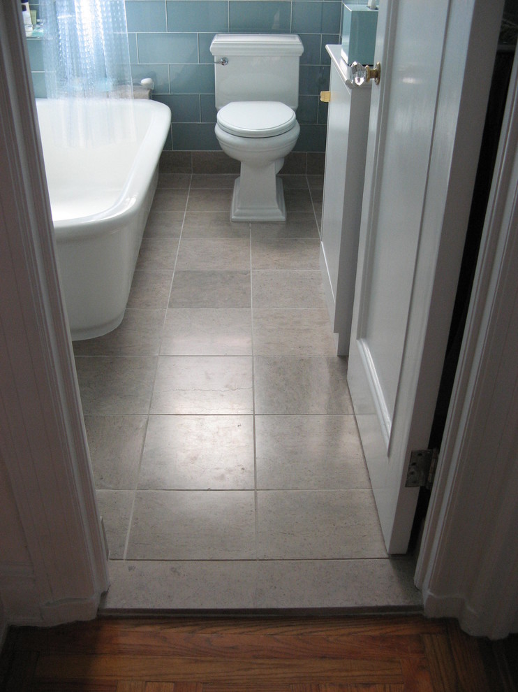 Example of a small trendy kids' blue tile and glass tile porcelain tile bathroom design in New York with a pedestal sink, a two-piece toilet and blue walls
