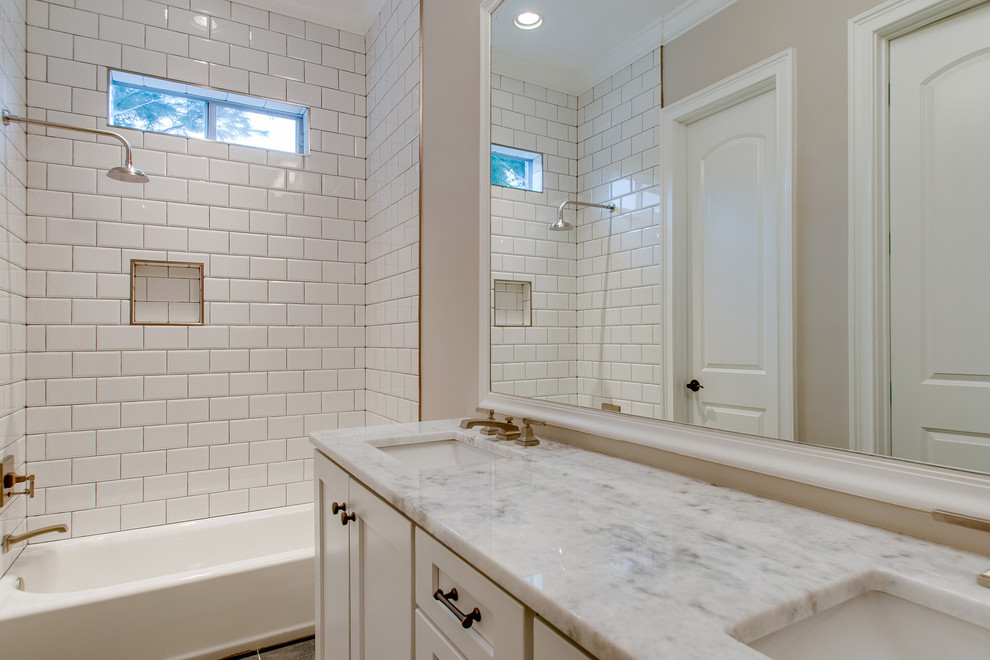 Bathroom - large transitional ceramic tile and white tile ceramic tile and gray floor bathroom idea in Nashville with shaker cabinets, white cabinets, a one-piece toilet, gray walls, an undermount sink, quartzite countertops and multicolored countertops