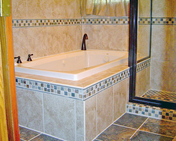This is an example of a small mediterranean shower room bathroom in Minneapolis with a built-in bath, an alcove shower, beige tiles, ceramic tiles, beige walls, ceramic flooring, beige floors and a hinged door.