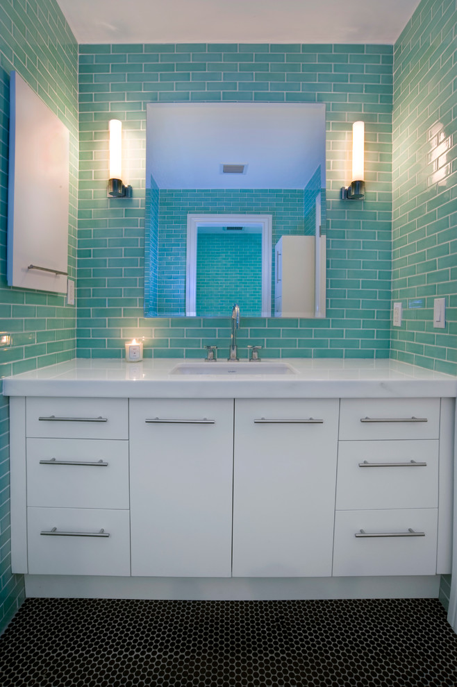 Bathroom - mid-sized kids' green tile and ceramic tile mosaic tile floor bathroom idea in Miami with an undermount sink, flat-panel cabinets, white cabinets, marble countertops and green walls
