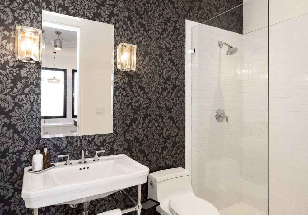 This is an example of a medium sized contemporary grey and white shower room bathroom in Denver with an alcove shower, a one-piece toilet, white tiles, an integrated sink, white worktops, ceramic tiles, ceramic flooring, white floors, a single sink, a built in vanity unit, wallpapered walls and white walls.
