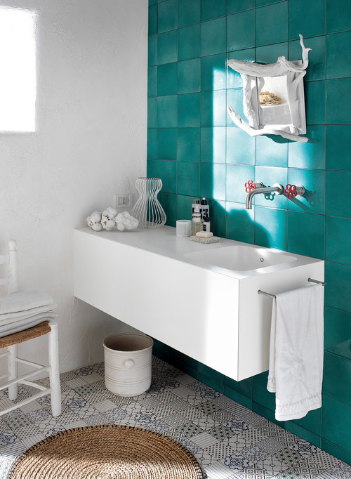 White Floating Vanity with Patterned Floor Tiles