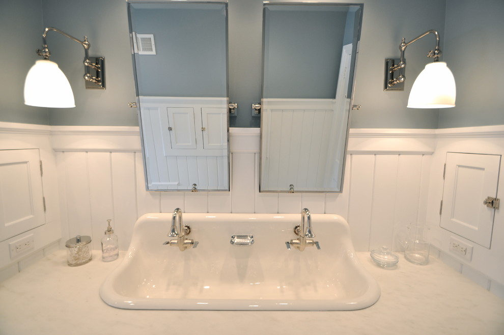 Inspiration for a mid-sized timeless kids' white tile and subway tile marble floor alcove bathtub remodel in New York with shaker cabinets, white cabinets, marble countertops, a two-piece toilet and blue walls