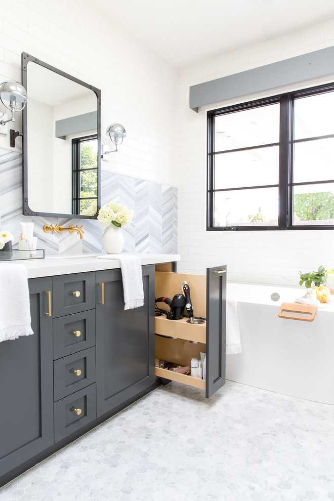 Design ideas for a large rural ensuite bathroom in Los Angeles with recessed-panel cabinets, grey cabinets, a built-in bath, a walk-in shower, grey tiles, ceramic tiles, white walls, white floors and an open shower.