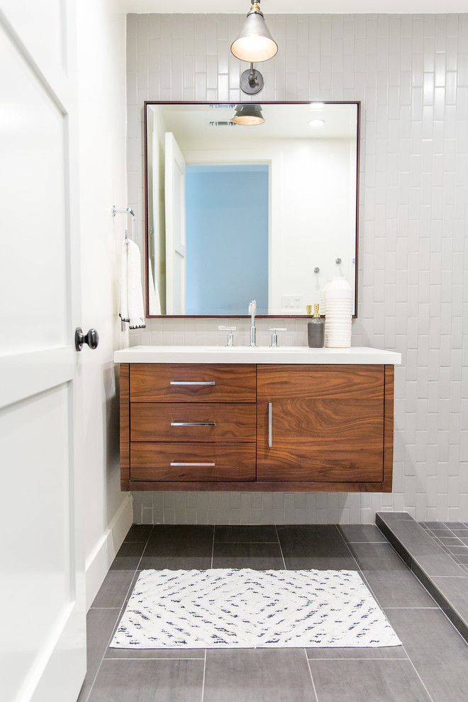 Example of a large farmhouse 3/4 white tile and ceramic tile bathroom design in Los Angeles with recessed-panel cabinets, gray cabinets and white walls