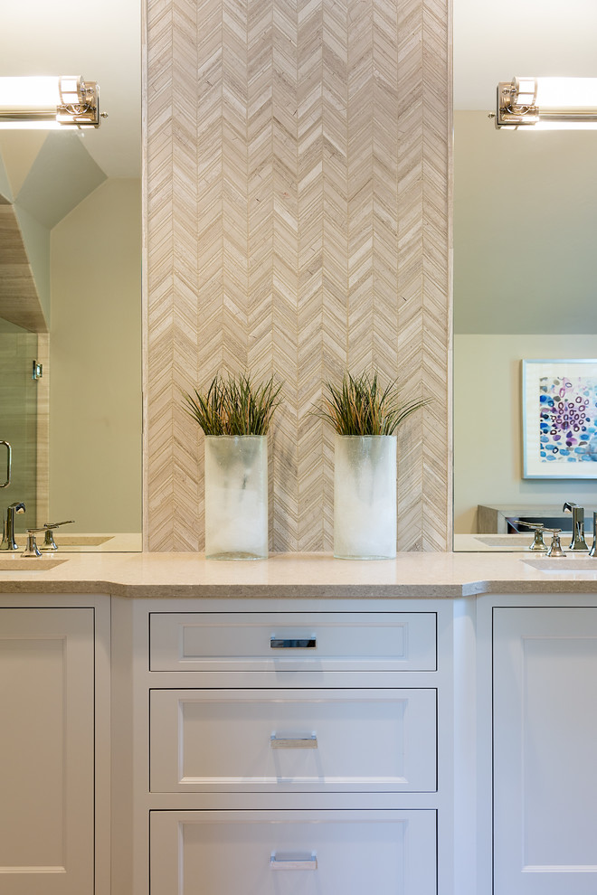Mid-sized transitional 3/4 beige tile and ceramic tile ceramic tile bathroom photo in Other with recessed-panel cabinets, white cabinets, limestone countertops, beige walls and an undermount sink