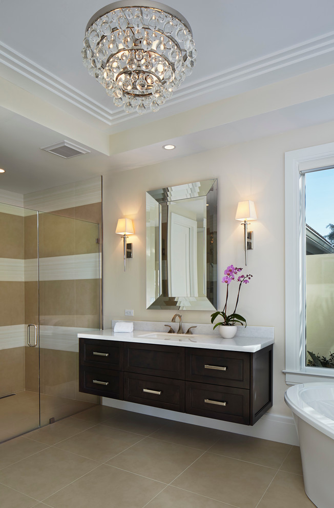 Bathroom - transitional beige tile bathroom idea in Miami with dark wood cabinets