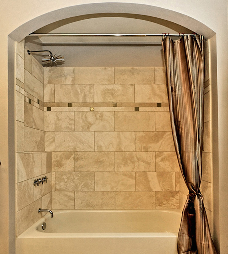 Example of a mid-sized classic beige tile and terra-cotta tile travertine floor bathroom design in Seattle with a vessel sink, shaker cabinets, brown cabinets, granite countertops, a one-piece toilet and beige walls