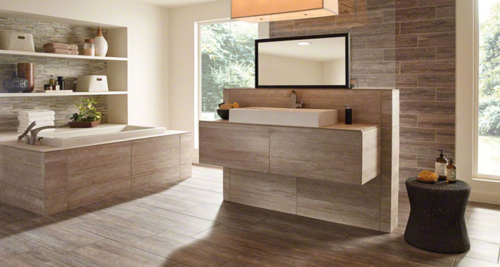 Large contemporary ensuite bathroom in Chicago with flat-panel cabinets, beige cabinets, a built-in bath, a walk-in shower, beige tiles, porcelain tiles, beige walls, porcelain flooring, a vessel sink, tiled worktops, brown floors and an open shower.