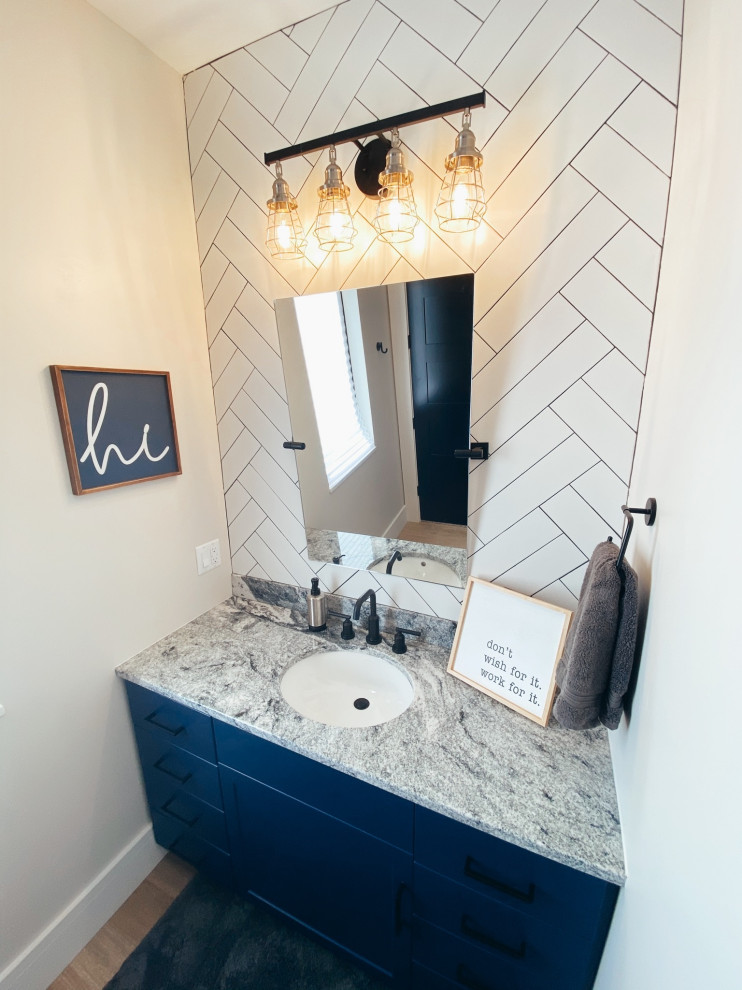 Inspiration for a small modern kids' single-sink bathroom remodel in Chicago with gray cabinets, white countertops, a freestanding vanity and granite countertops