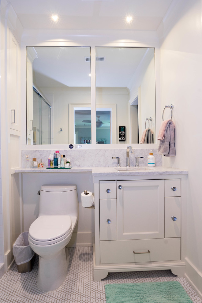 Photo of a small traditional family bathroom in Other with beaded cabinets, white cabinets, a one-piece toilet, white walls, ceramic flooring, a submerged sink, marble worktops, white floors and grey worktops.
