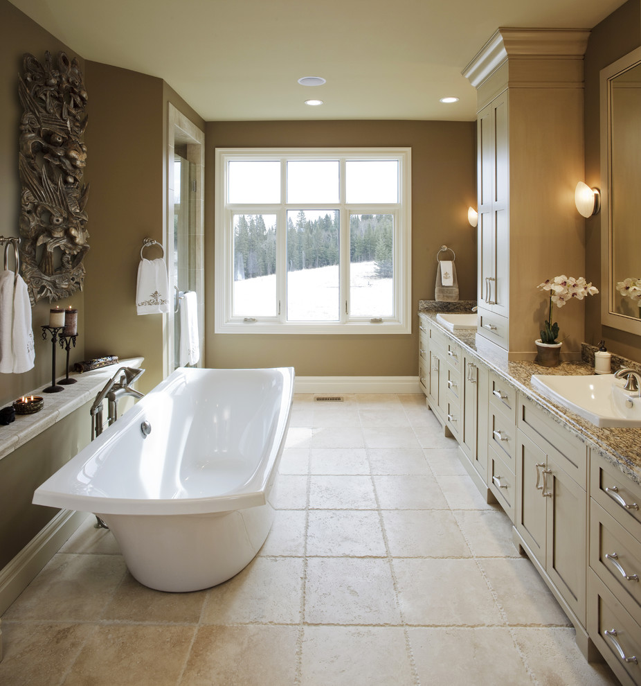 Inspiration for a traditional bathroom in Calgary with a freestanding bath and feature lighting.
